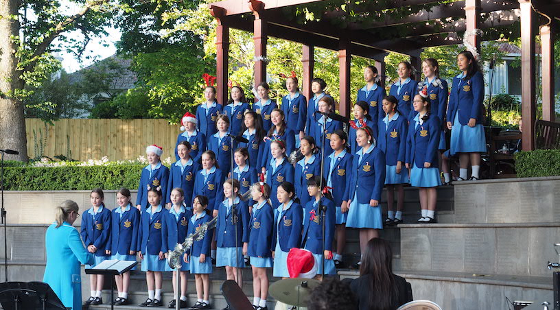 Rathfarnham students singing Christmas carols in the Glade